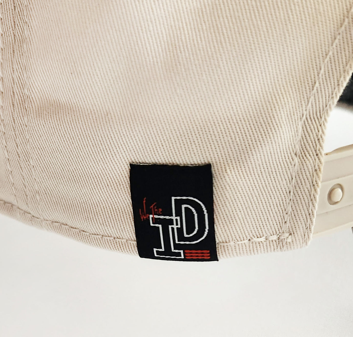 WTID Snap-Back Cap back pip tag