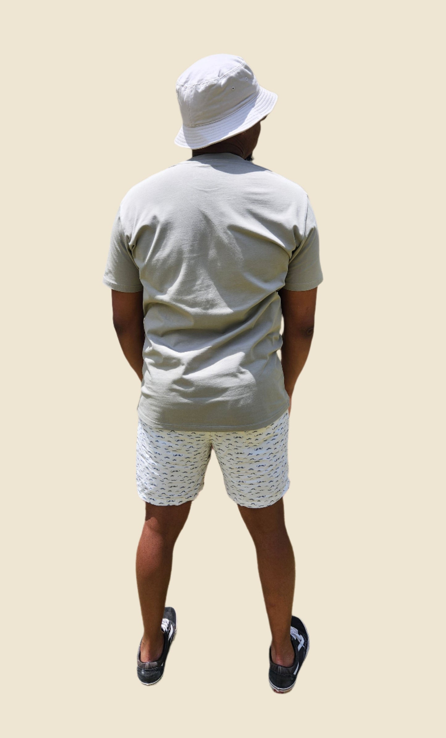 green tee on model back