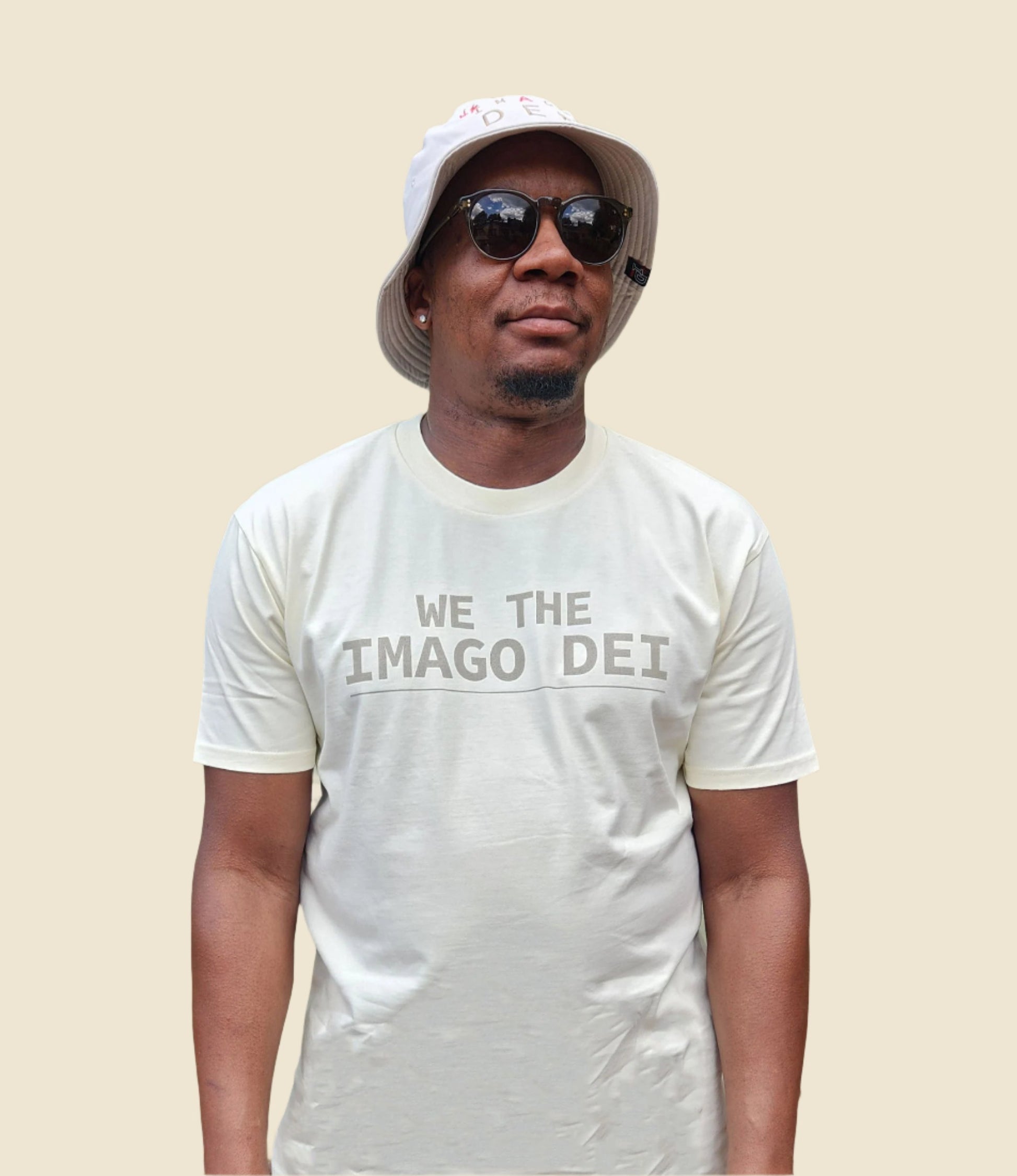 butter tee on make model with bucket hat close up