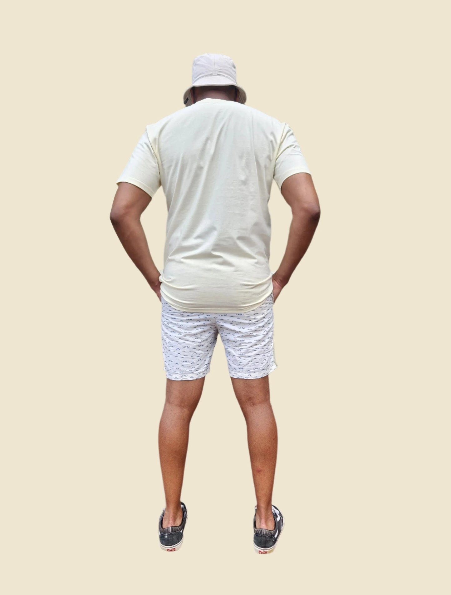 butter tee on make model with bucket hat - back view